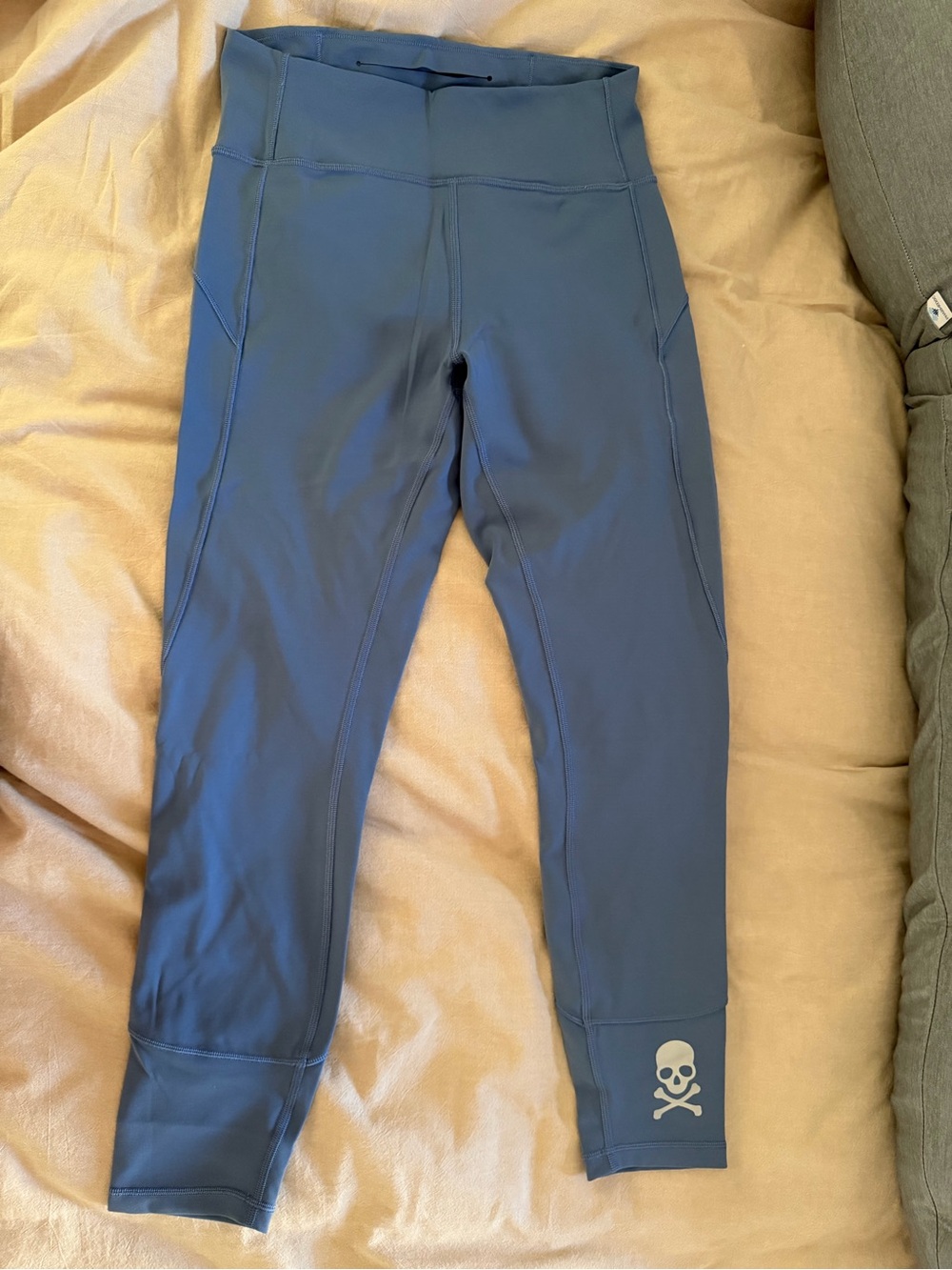 Used  High-Rise Athletic Leggings in Slate Blue with Skull Accent